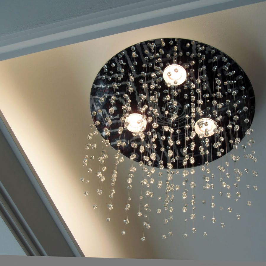 Circular ceiling fitting with cascading crystal drops